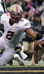 Montel Harris stretches to score a touchdown in the second quarter.