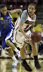 Jasmine Thomas (5) chases Jaclyn Thoman as she dribbles upcourt during the second half.