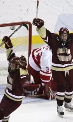 Boston College forwards Cam Atkinson, left, and Brian Gibbons celebrate. (AP Photo/Carlos Osorio)