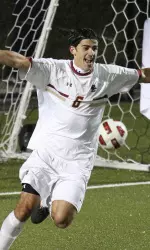 Steve Rose celebrates the Eagles' OT win over Duke.