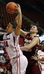 Katie Zenevitch (45) grabs for the ball with Rutgers' April Sykes (24) during the first half. (AP Photo)