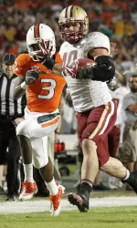 Luke Kuechly ran an interception back for a touchdown and became Boston College's all-time tackles leader, and the Eagles picked Jacory Harris off four times in his final college game en route to beating Miami 24-17