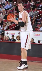 Dennis Clifford looks for a pass. Clifford had 16 points and six rebounds.