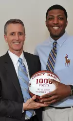 Head coach Steve Donahue presented senior Corey Raji with his 1000-point ball.