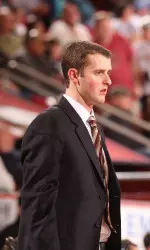 Woody Kampmann has been promoted to assistant coach.