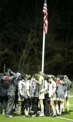 BC team gathering in the traditional corner spot under the flag prior to the match vs. Hofstra.