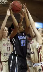 Alexa Coulombe and Nicole Boudreau guard Duke forward Richa Jackson.