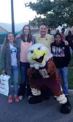 Coach Johnson poses with Baldwin and Rachel Gartner, Katie Quandt and Ashley Kelsick.