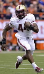 Andre Williams runs for a first-quarter touchdown before leaving the game with an injury.