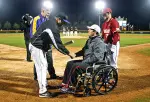 Frates was presented with a commemorative bat before the game.