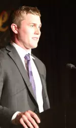 Captain Pat Mullane addresses the Pike's Peak Hockey Club at its annual awards dinner at the Westin hotel in Waltham, Mass.