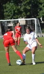 Madison Meehan battles at midfield during the 1-0 win over BU.