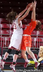 Kelly Hughes makes a key block in the Eagles win over Virginia Tech on Sunday afternoon.