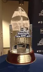 The George M. Steinbrenner Championship Trophy, presented to the winner of the New Era Pinstripe Bowl