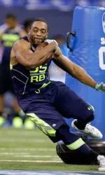 Andre Williams is timed in the three-cone drill at the NFL Combine at Lucas Oil Stadium in Indianapolis.