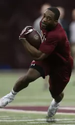 RB Andre Williams, the 2013 recipient of the Doak Walker Award given to the nation's premier running back, participates in drills during BC Pro Day on Wednesday.