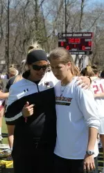 Acacia Walker (left) and assistant coach Alex Frank talk strategy. Walker was named Northeast Regional Coach Of The Year by the IWCLA this morning.