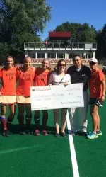 Kathleen Murphy ('09) with captains Plasteras, Hospodar, Sebia and coach Lamb
