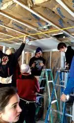 Student-athletes who participated in the 2015 Devlin S-AFE Trip helped re-build homes in New Orleans.