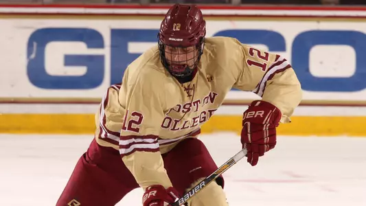 Tuch Alex skating maroon