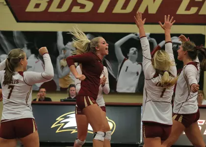 Volleyball team celebrate following win
