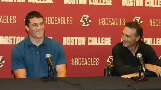 Luke Kuechly and Doug Flutie
