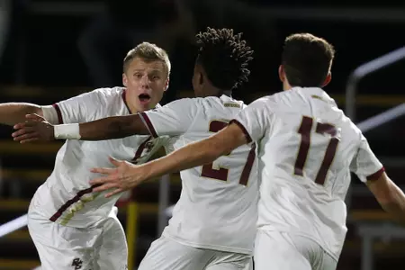 Callum Johnson celebrates with teammates
