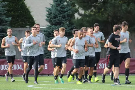 Men's Soccer warming up