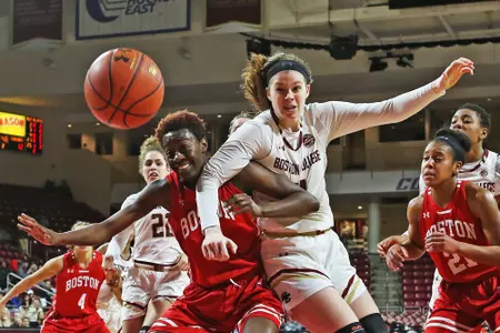 Emma Guy battling for rebound