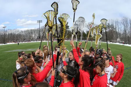 lacrosse sticks high huddle