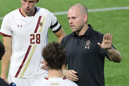 Bobby Thompson at halftime in a huddle vs. Merrimack (10.1.19)