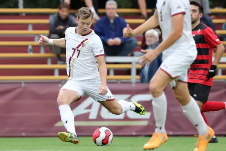 Kristofer Konradsson shields the ball from a Northeastern defender (10.8.19)