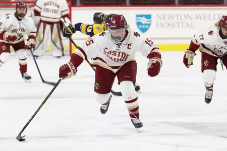 Erin Cononlly skates the puck up the ice against Merrimack.
