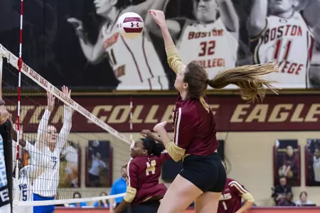 Clare Naughton jumps for an attack in Power Gym