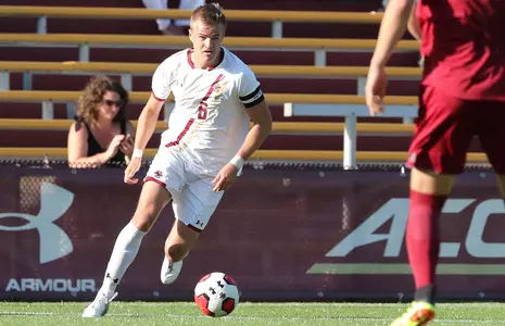 Joe Kellett dribbling up field against Umass - October 2019