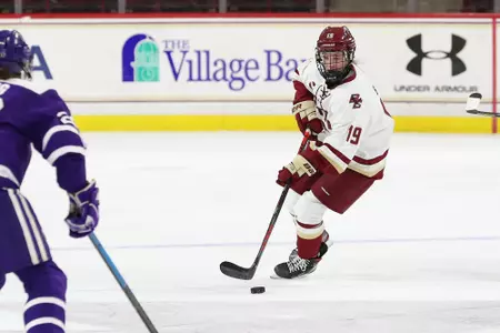 Hannah Bilka skates up the ice against Holy Cross.