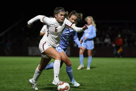 Emily Langenderfer dribbles up the field in a game against UNC