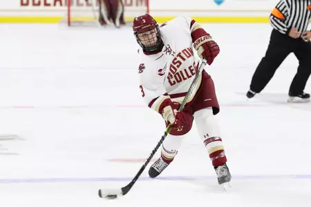 Deirdre Mullowney shoots the puck against Holy Cross.