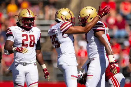 The BC defense celebrates a stop at Rutgers.