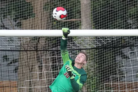 Christian Garner punches the shot over the crossbar in a 0-0 tie vs. Merrimack - 10.1.19
