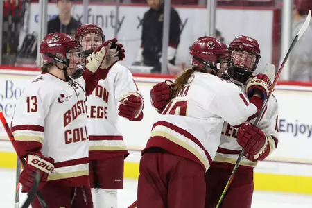 The Eagles celebrate a goal against UNH.