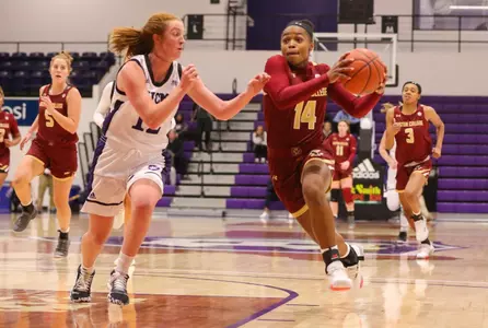 Marnelle Garraud drives to the hoop during the game at Holy Cross on Nov. 13, 2019.