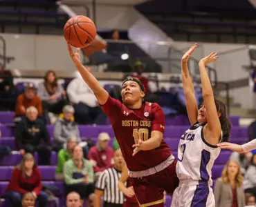 Makayla Dickens drives to the hoop at Holy Cross on Nov. 13, 2019