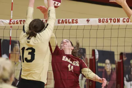 Cat Balido makes a kill over a Wake Forest blocker