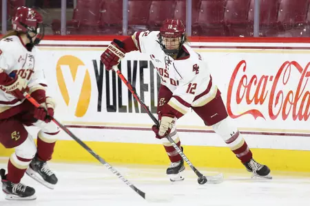 Olivia Finocchiaro looks to make a breakout pass against UNH.