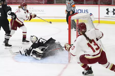 Savannah Norcross scores a goal against Providence.