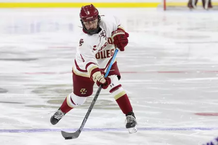 Hadley Hartmetz shoots the puck against Holy Cross.