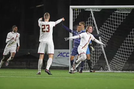 Mike Suski celebrates a goal against Yale.