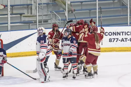 The Eagles celebrate Savannah Norcross' game-winning goal at UConn.