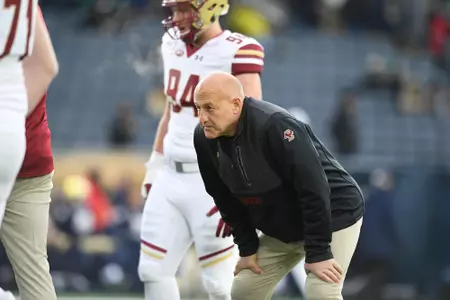 Head coach Steve Addazio oversees warm-ups at Notre Dame.